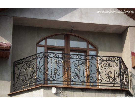 Кованые решетки на балкон фото